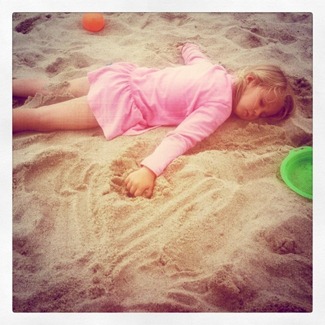 asleep on the beach